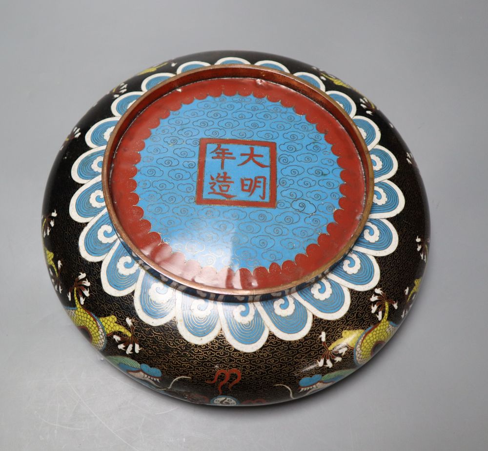 An early 20th century Chinese dragon bowl, a box and cover and a ginger jar and cover, largest diameter 30cm